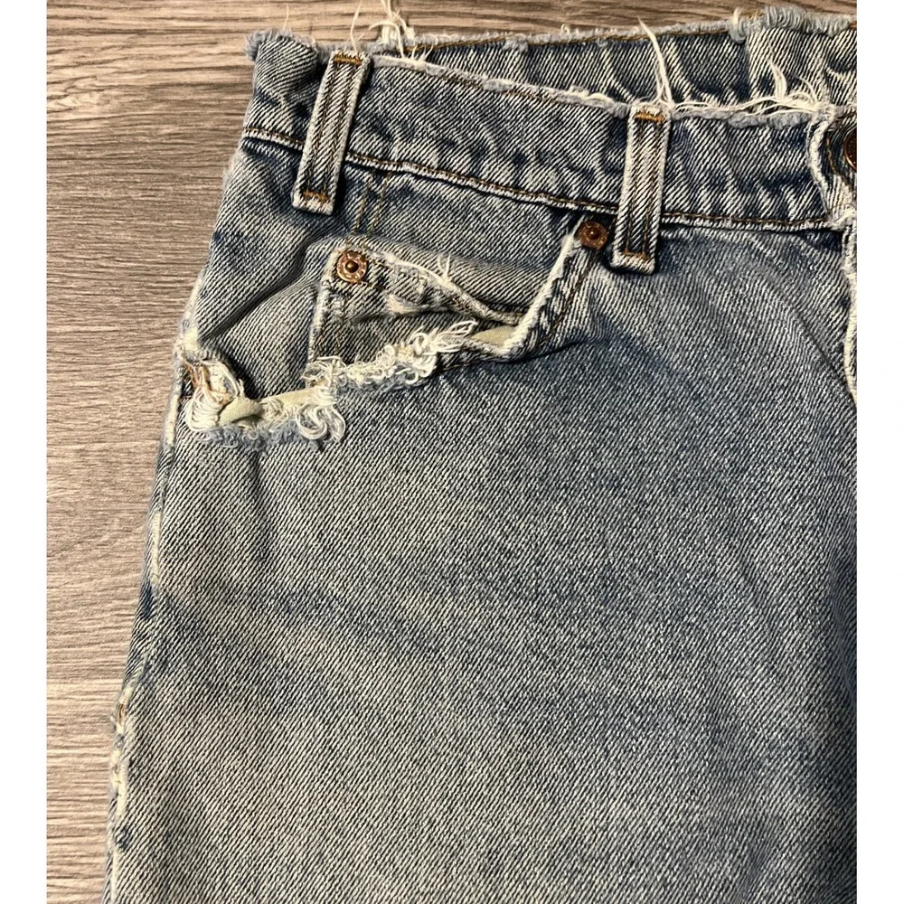 Vintage Levi's 550 Heavily Distressed Light Wash Blue Jean Shorts Size 32x10 USA